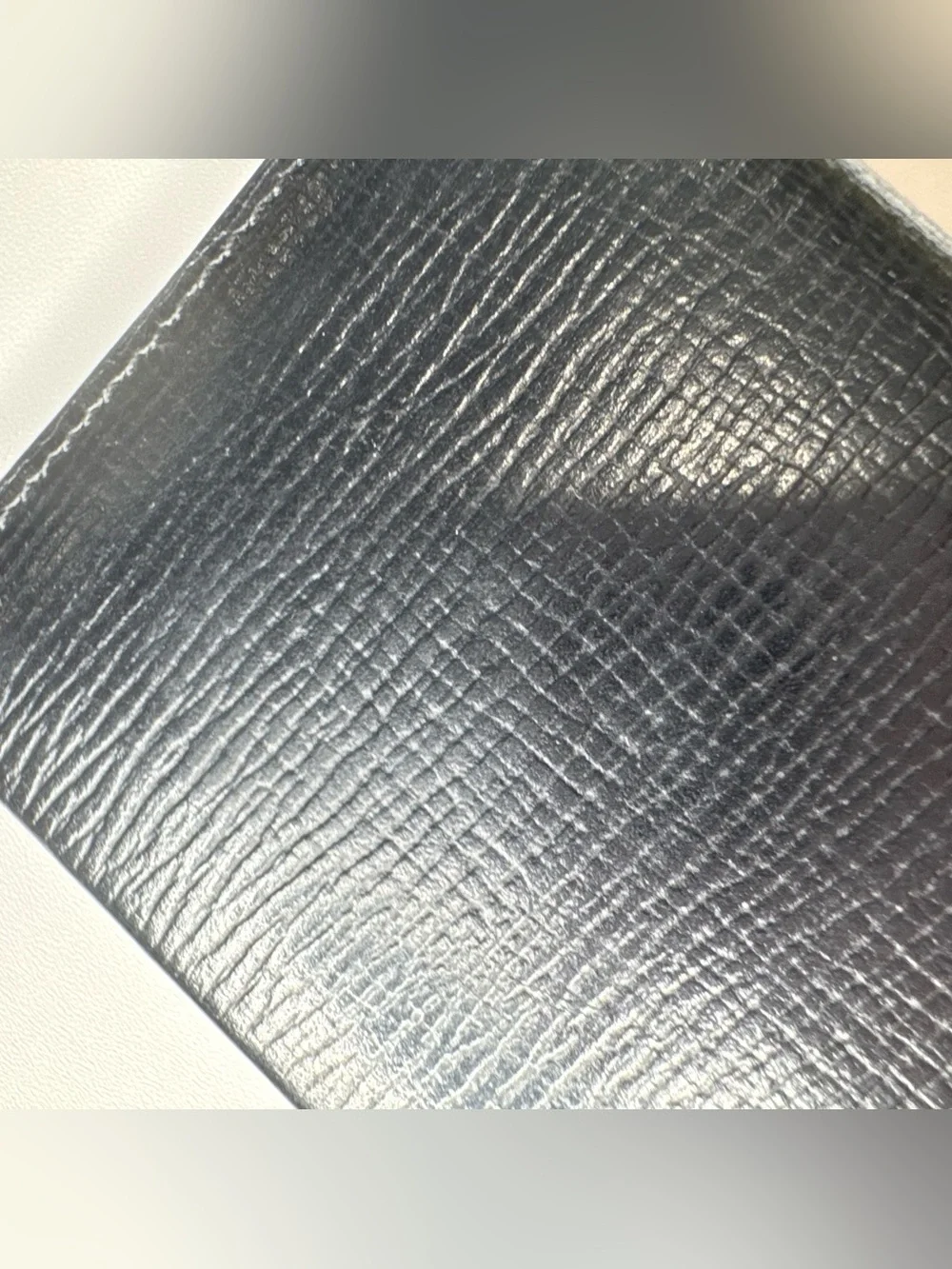 Tumi black leather
